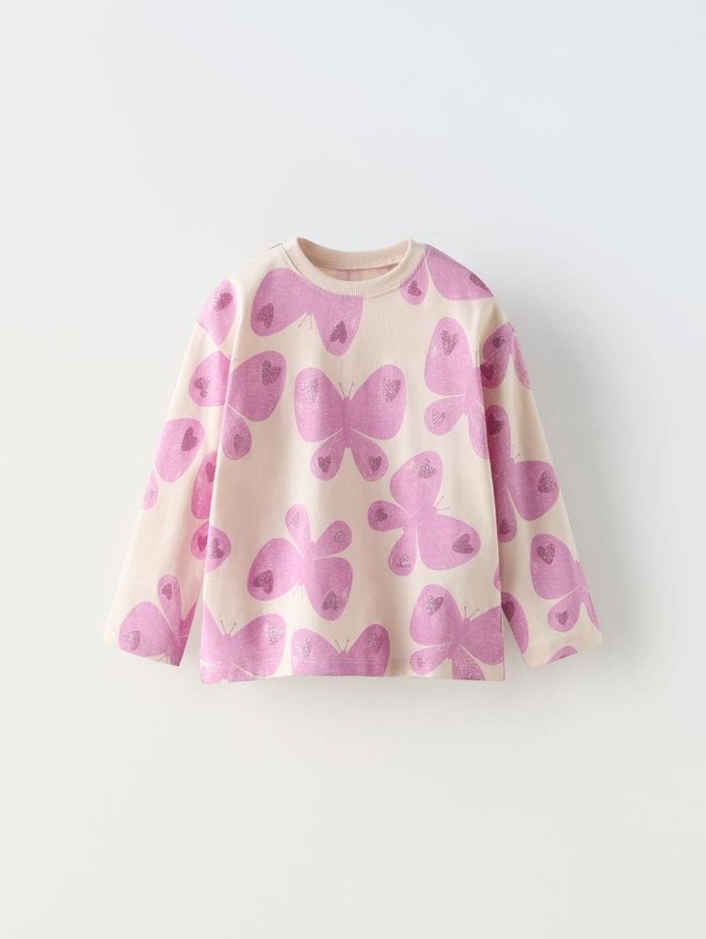 T-SHIRT WITH ROUND NECK AND LONG SLEEVES. SPARKLY PRINT DETAIL SIZE 1 1/2 YEARS